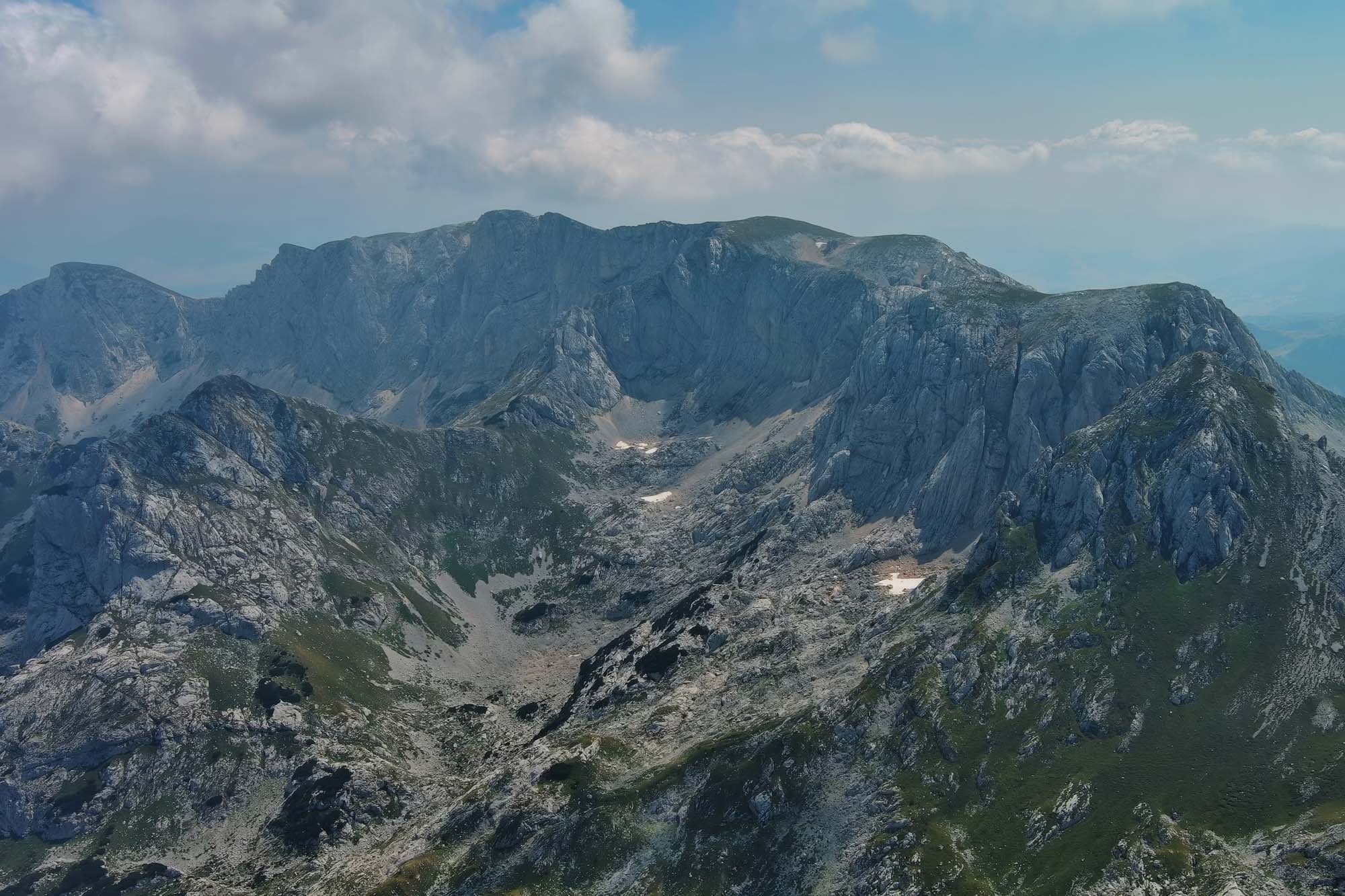 Flying in Durmitor mountains. Durmitor National park in Montenegro. Beautiful aerial mountain landscape