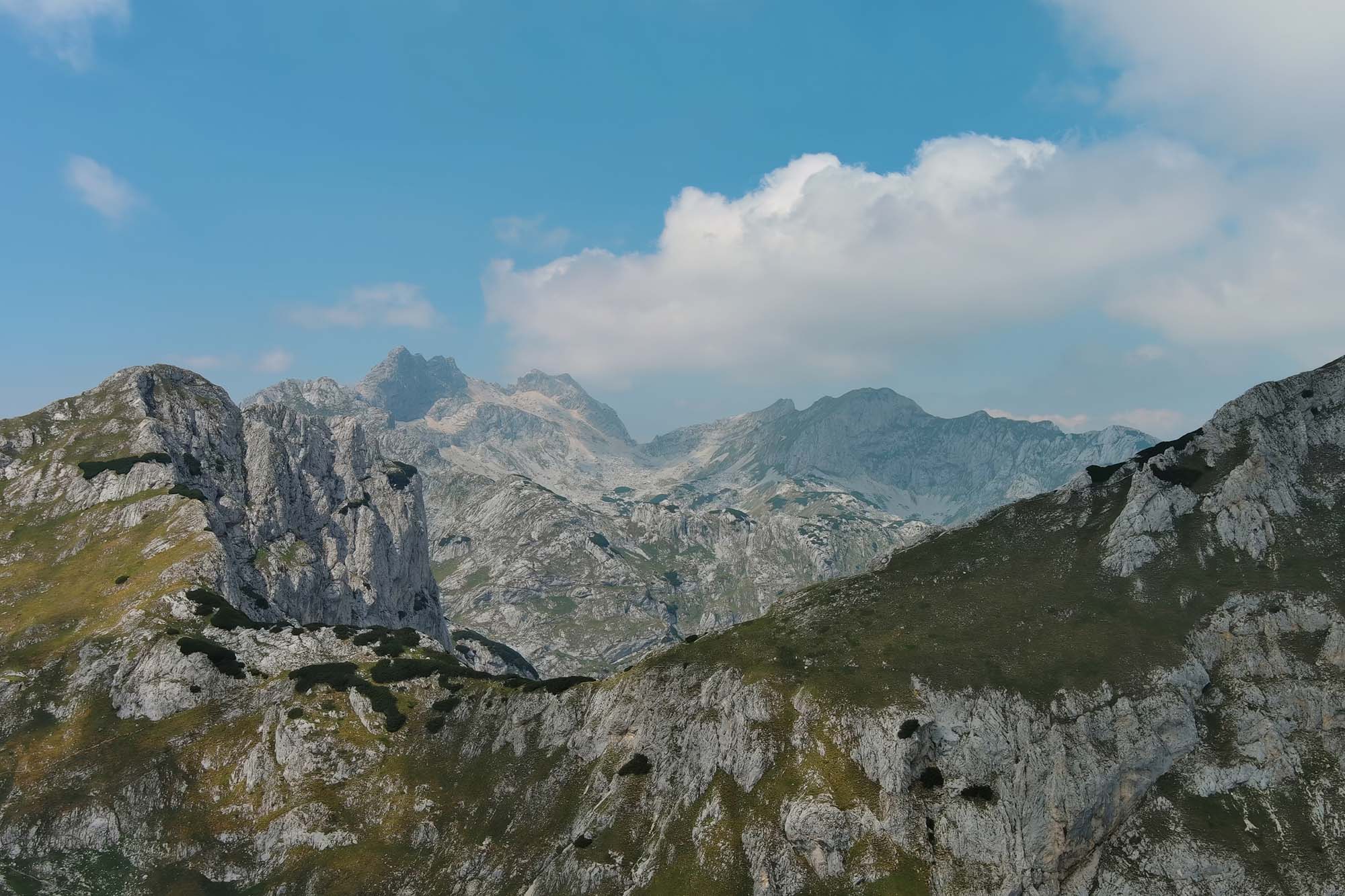 Flying in Durmitor mountains. Durmitor National park in Montenegro. Beautiful aerial mountain landscape
